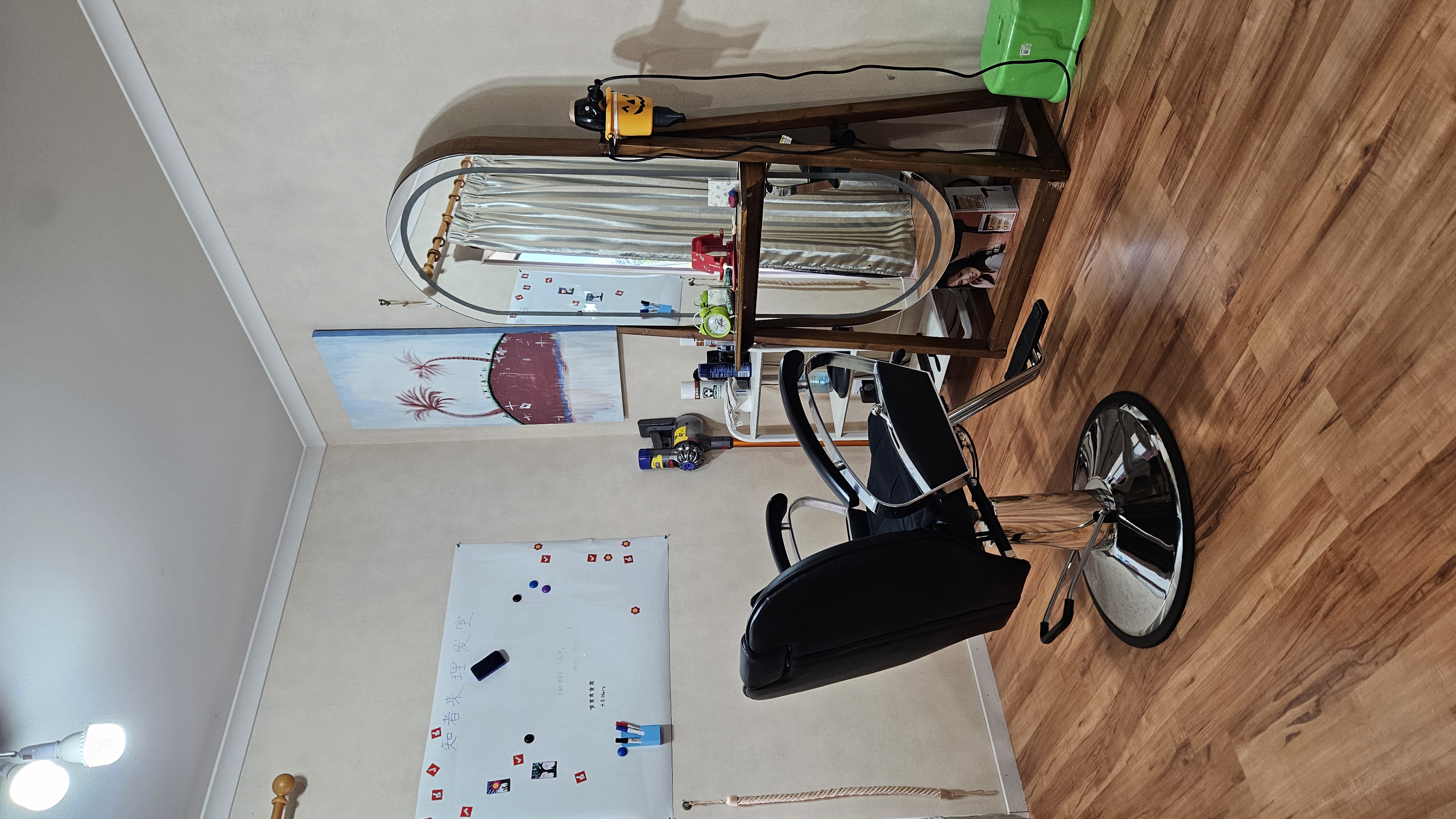 Barber Sam's studio with professional barber chair and mirror