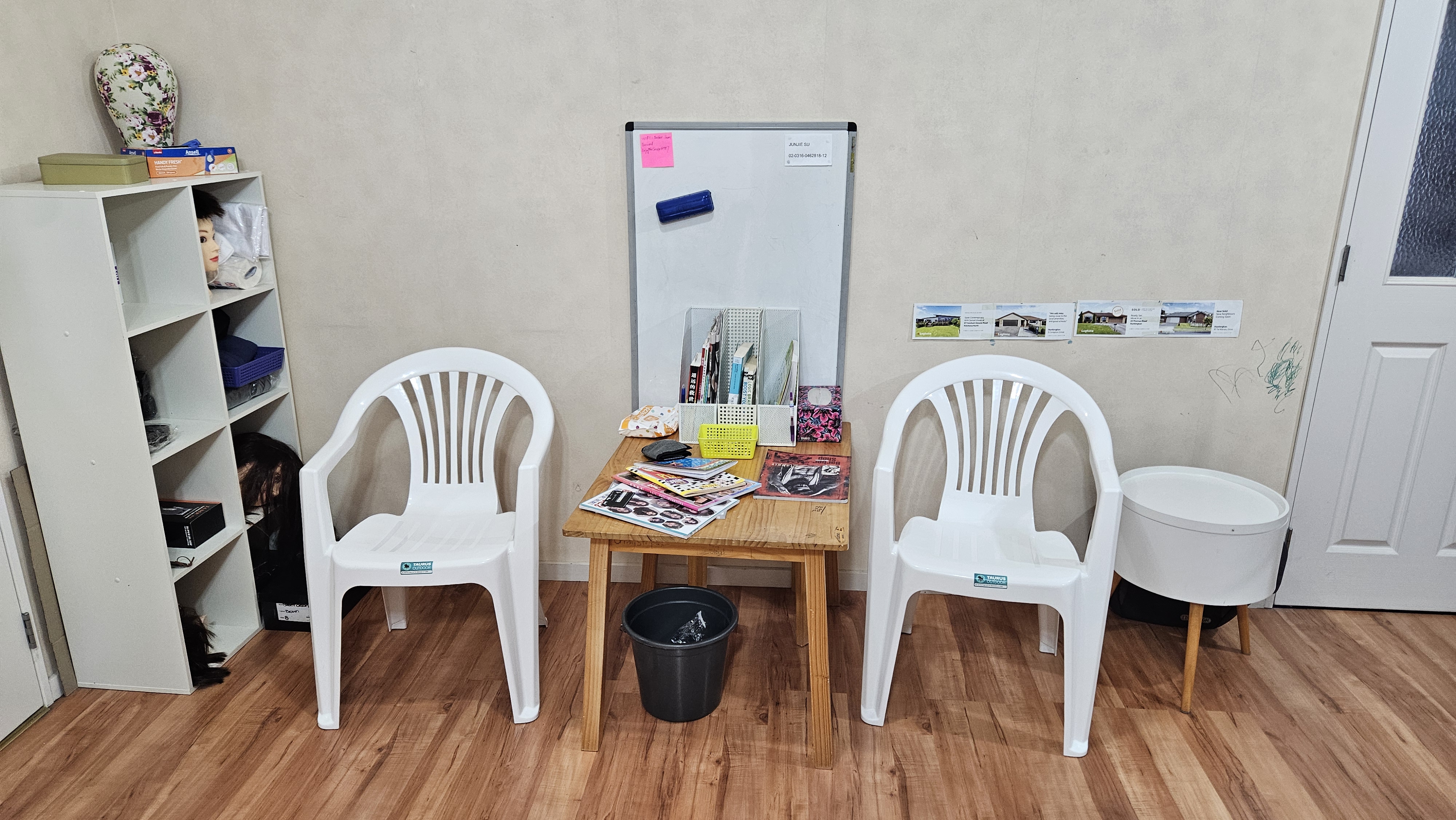 Comfortable waiting area with magazines and supplies
